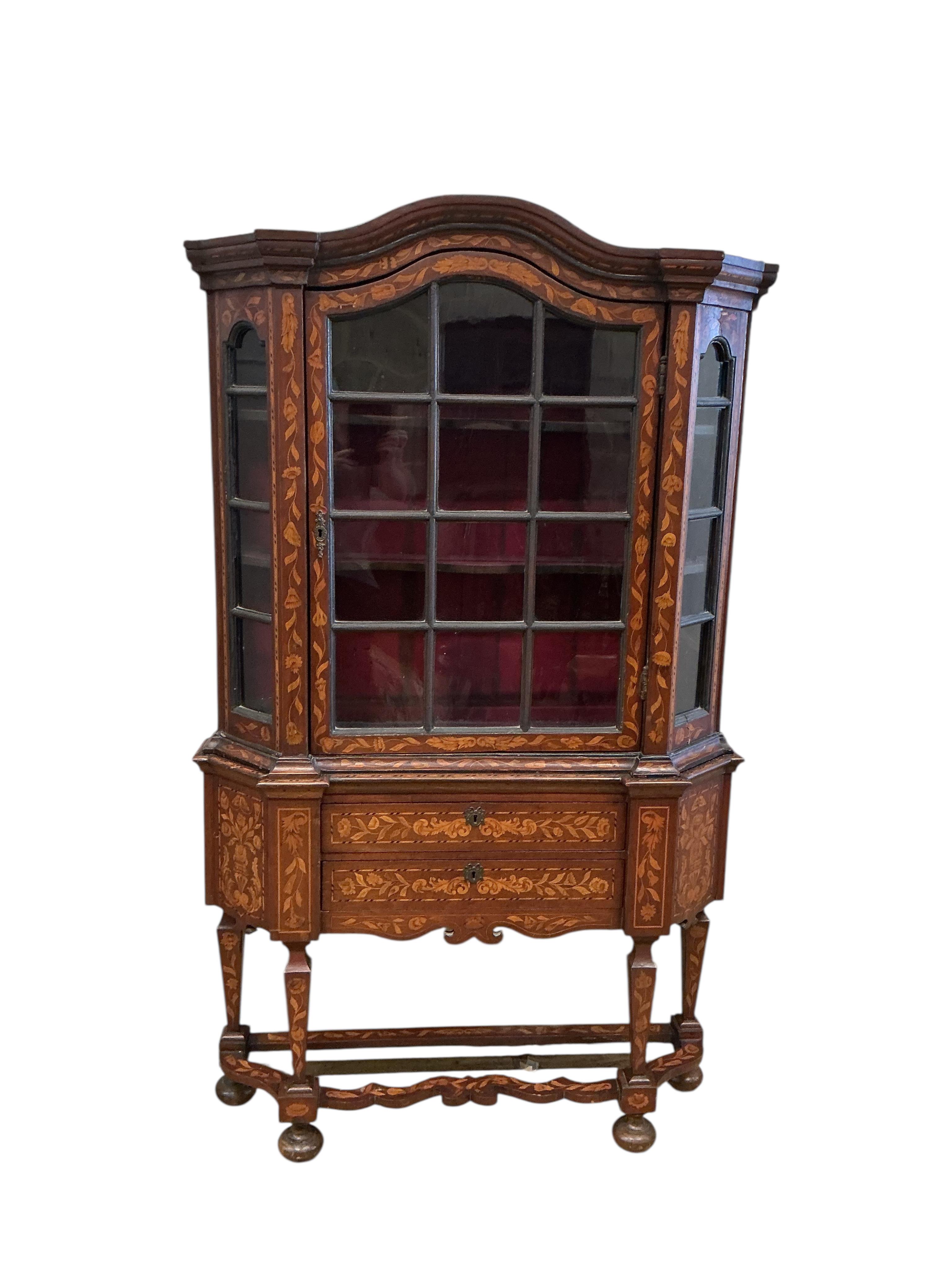 A late 18th / early 19th century Dutch floral marquetry walnut display cabinet, width 116cm, depth 30cm, height 196cm